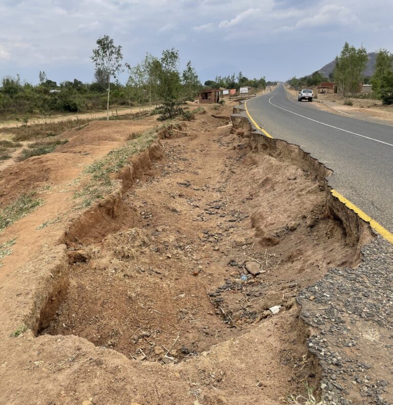 Flood damage to road following Cyclone Freddy.