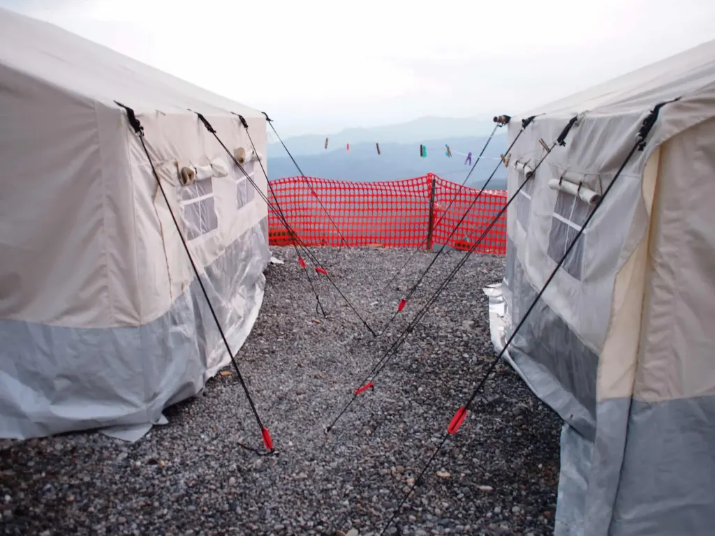 Emergency tents set up in Nepal following an earthquake, illustrating JBA’s expertise in emergency preparedness and response to support recovery efforts in disaster-affected areas | JBA Global Resilience.