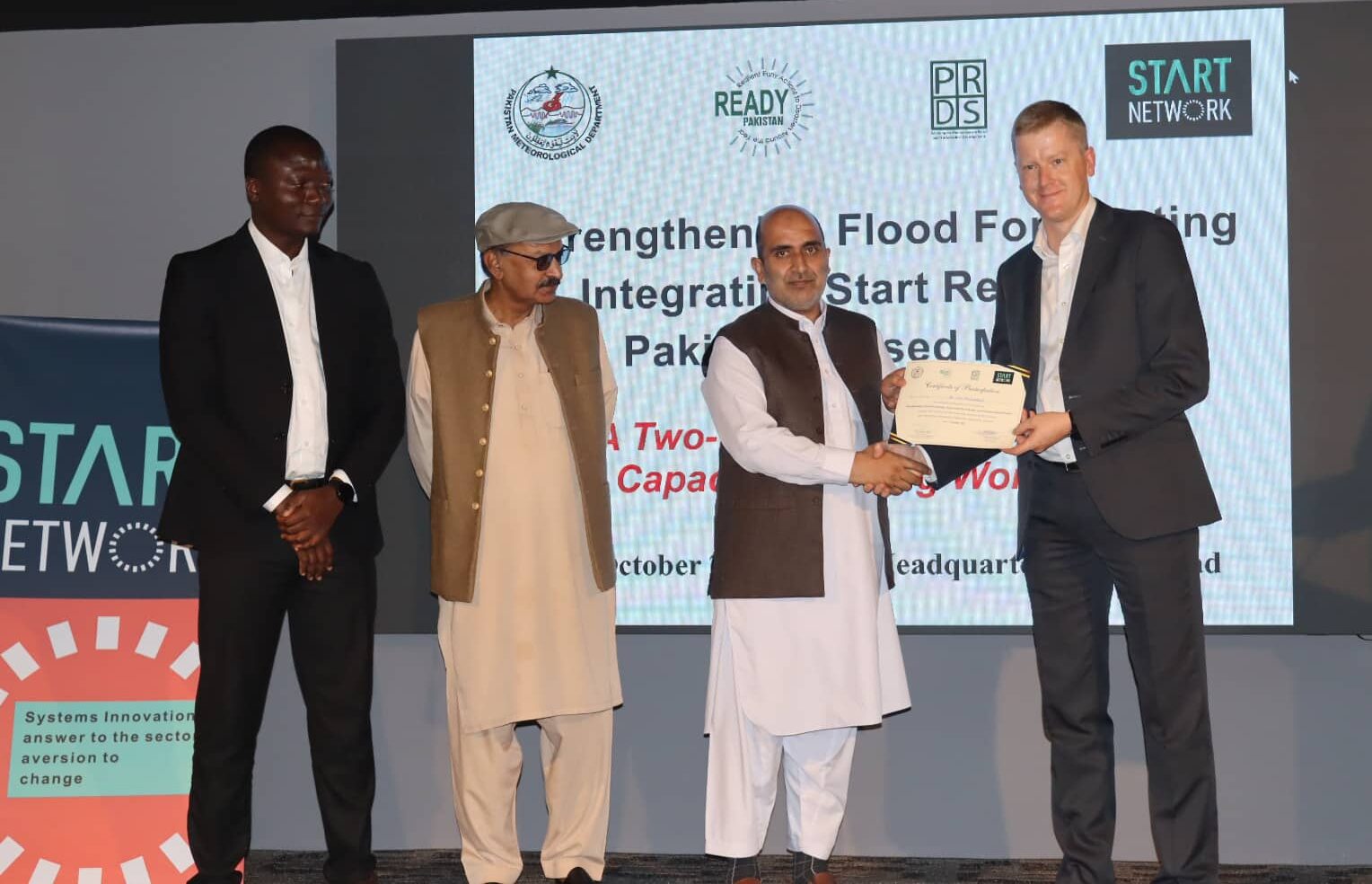 Representatives from JBA Global Resilience, the Pakistan Meteorological Department and the Start Network at a flood forecasting and anticipatory action capacity building workshop in Islamabad.