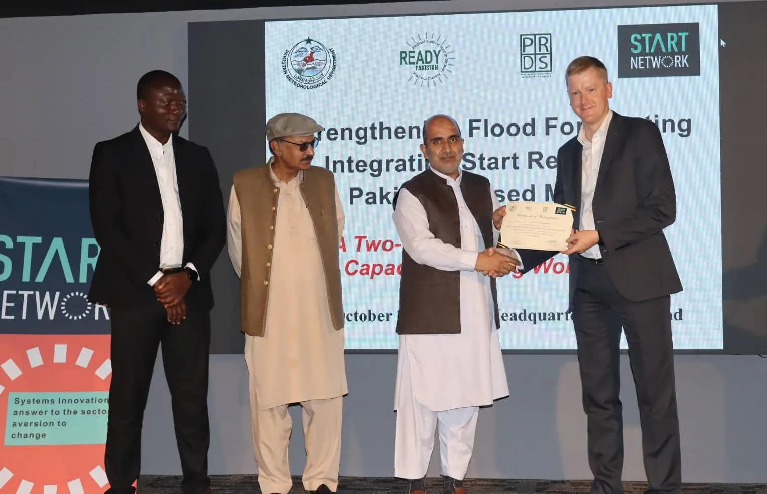 Representatives from JBA Global Resilience, the Pakistan Meteorological Department and the Start Network at a flood forecasting and anticipatory action capacity building workshop in Islamabad.